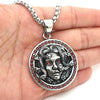 Medusa pendant<br> Silver and Garnet
